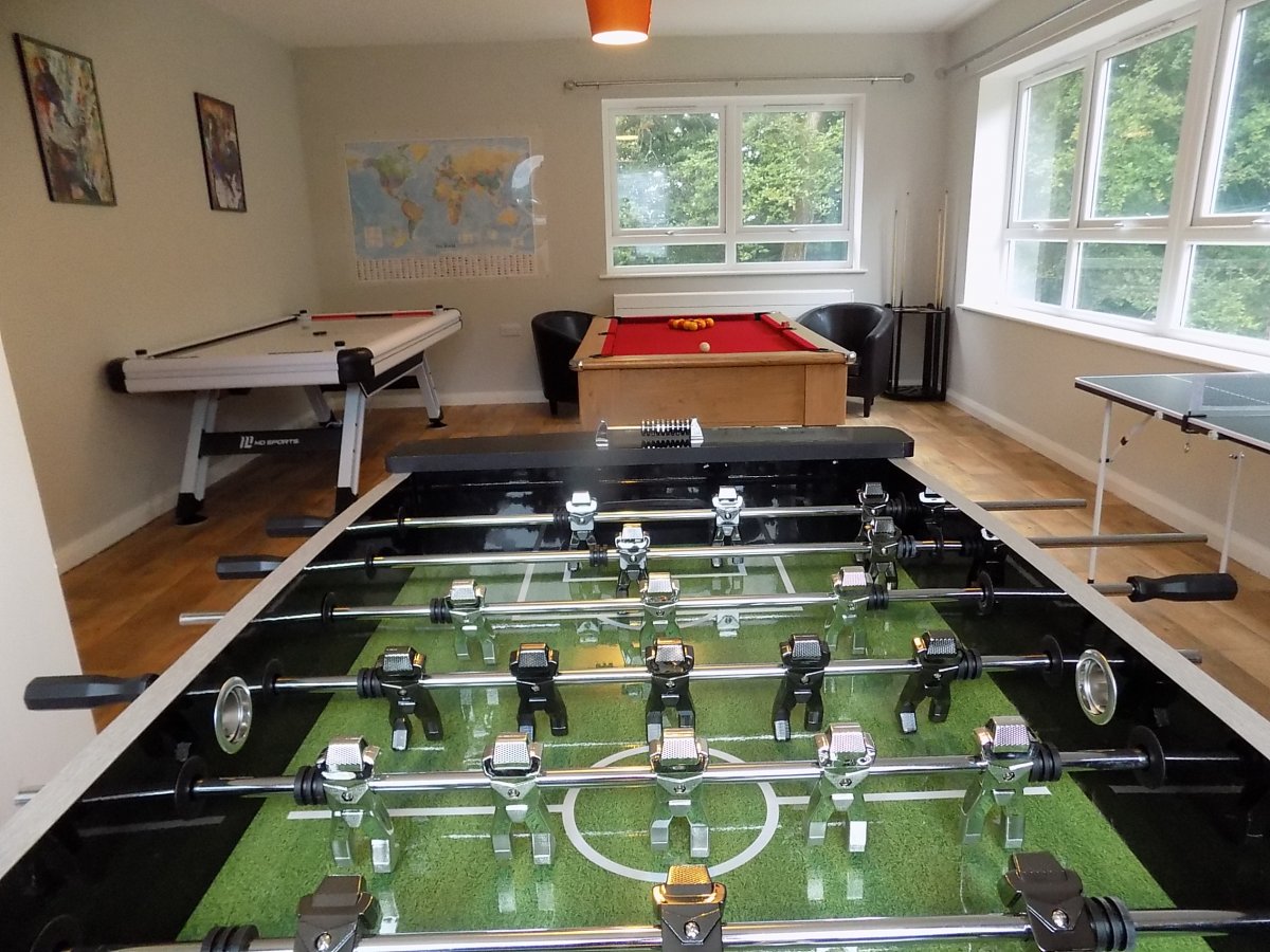 Games room with table football, pool and Fussball at The Cadwalader